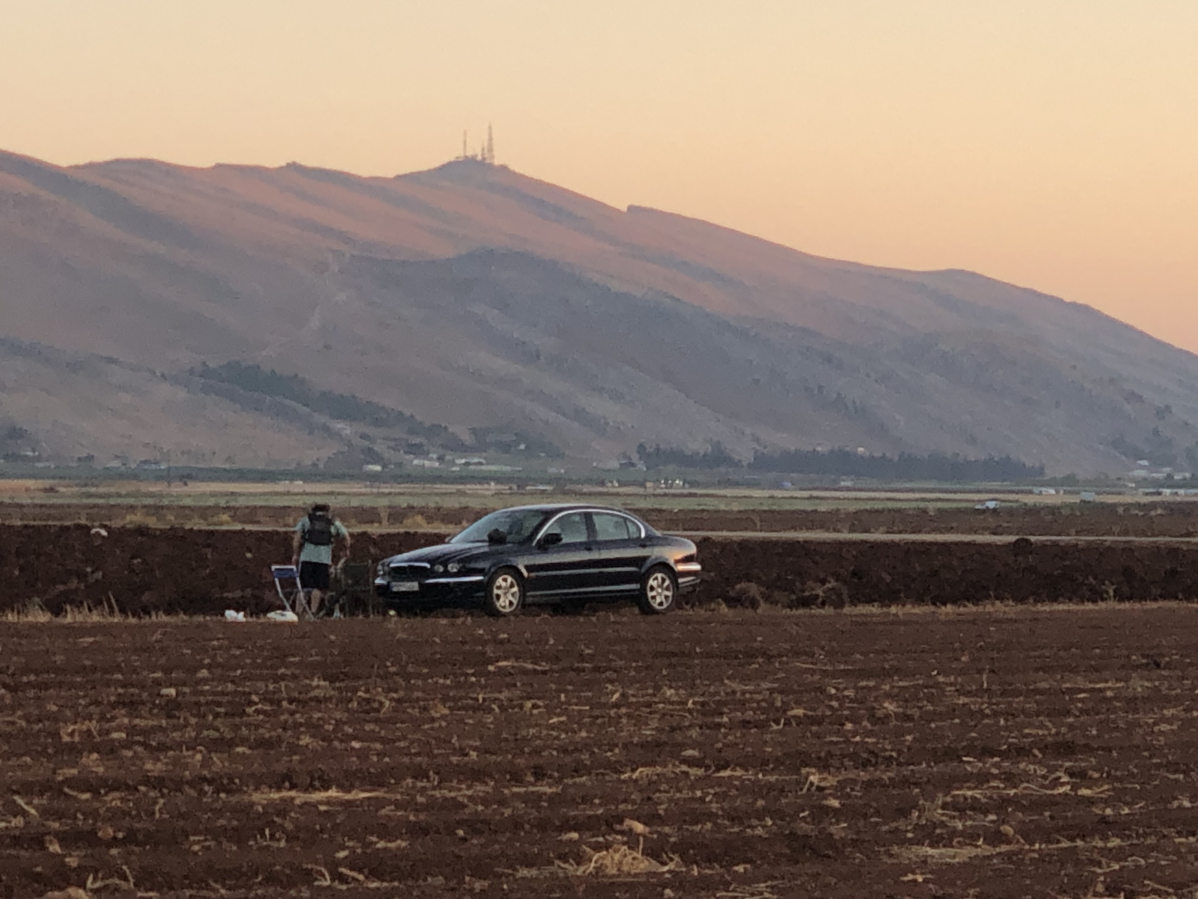 Cruising through the Bekaa Valley, where the open roads meet endless mountains and golden fields. There’s a timeless feeling in driving a Jaguar X-Type through Lebanon’s beautiful countryside — elegance, freedom, and the simple joy of being on the road. - Shot on iPhone X | PictShare.online photography